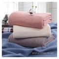 China 100% Cotton Breathable waffle sofa throw knit blanket Manufactory